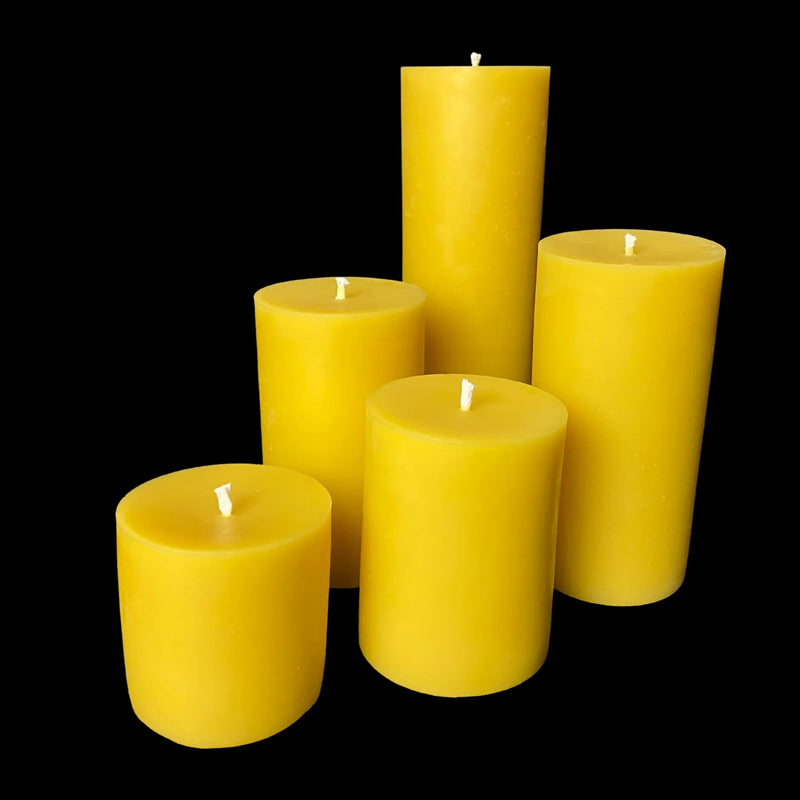 Yellow beeswax pillar candle group in 5 sizes, perfect for cheerful decor or handmade gift boxes.